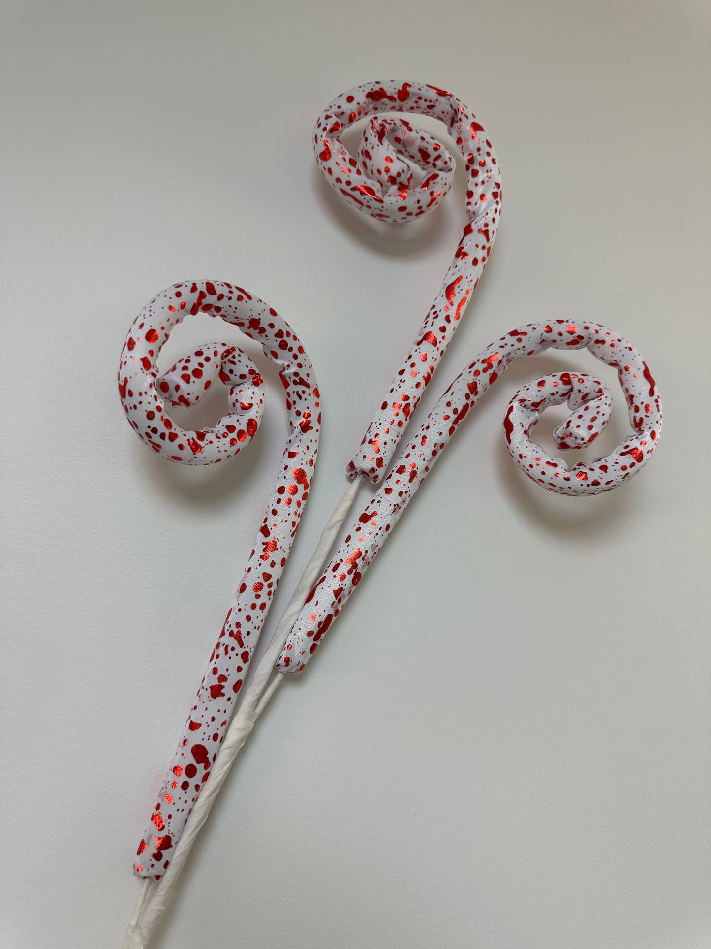 Red and white Speckled Swirl Pick